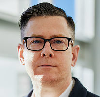 Alexander Hughes administrerende direktør portrett kryptohandelsselskap leder